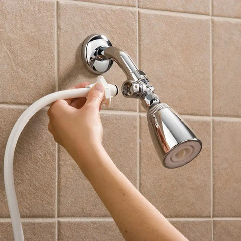 Snap N Spray Quick Connect Detachable Shower Hose with On Off Sprayer being attached to shower head.