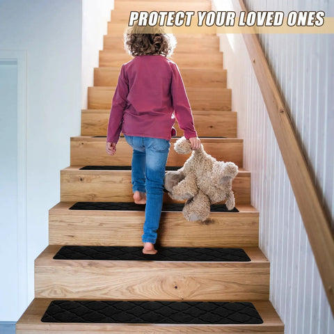Child walking on wooden stairs with black 8 By 30 Inch Stair Treads 15 Piece Non Slip Peel and Stick Indoor Rug Runner for Wooden Steps.