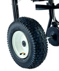 14-Inch knobby pneumatic tire of Walk-Behind Broadcast Spreader for Fertilizer, Grass Seed and Salt, 80 Lb Hopper, sturdy frame visible