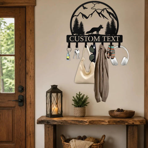 Personalized Lion Key Holder For Wall Custom Family Name Metal Key Organizer with nature design above rustic entryway table.