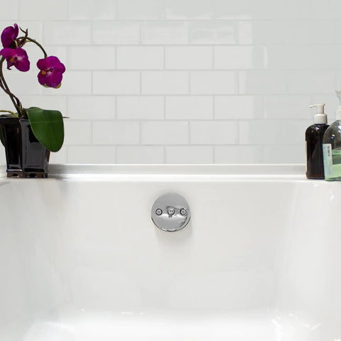 Durable Polished Chrome Trip Lever Overflow Plate With Screws 50 Pack Three Inch Eighth For Two Hole Waste Elbows Heavy Duty Brass Styled Bath Spill Cover Easy Install in a bathtub setting.