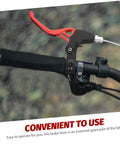 Close-up of 3 Pair Aluminum Alloy Bike Brake Levers Set Red For Mountain And Road Bikes installed on handlebar