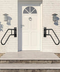 Solid As A Rock Matte Black Outdoor Handrail For One To Three Step Stairs Heavy Wall Mounted Grab Bar with hardware installed by entrance.
