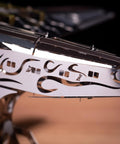 Close-up detail of Splashing Dreamer 3D Metal Airplane Model Kit With Wind-Up Moving Mechanism, featuring stainless steel construction