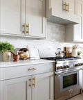 Champagne Bronze Cabinet Pulls 3 Inch 76mm 10 Pack Honey Bronze Kitchen Cupboard Handles installed on white kitchen cabinets