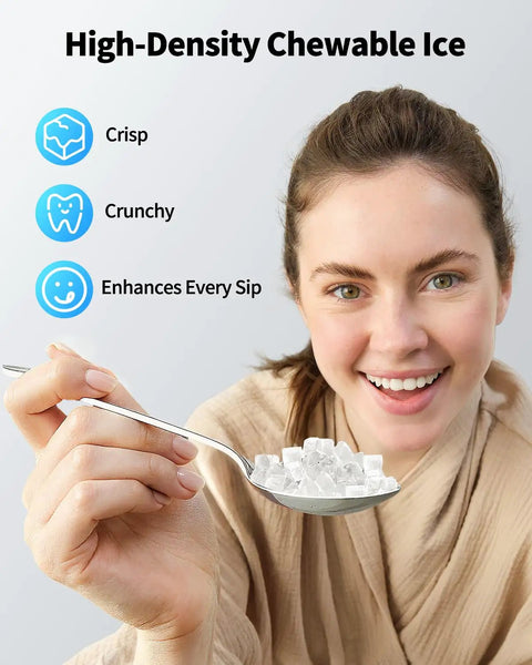 Woman holding spoonful of chewable ice, highlighting features of Nugget Ice Maker With Handle, 40 Lbs Per Day, Countertop Ice Maker Ready In 5 Minutes.