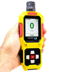 Hand holding Ammonia Gas Detector For Farms And Livestock With Large Digital Display 0 To 100 ppm Range 1 ppm Resolution UK Sensor