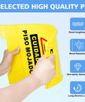 2 Pack Must Have Fold Out Wet Floor Sign Set, 17.5 Inch High Yellow Caution Signs, shown being folded to demonstrate flexibility.