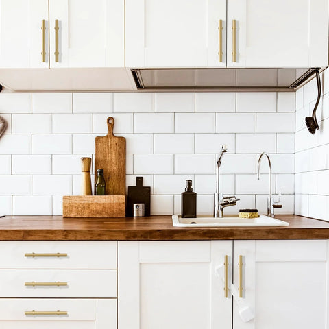 3 Inch Solid Brass Cabinet Pulls Round Bar Handles Brushed Gold 4 Pack installed on kitchen cabinets