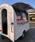 Ready To Roll Custom Mobile Food Truck Trailer With Commercial Kitchen Stainless Sink Refrigerator And Secure Storage, rear view.