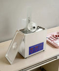 Heavy Duty 6.5L Ultrasonic Cleaner With Quick Heat And Bright Digital Screen, Rugged Stainless Vat For Jewelry And Shop Tools, 40KHz Vibes Scrub Away The Gunk Like A Champ on a table with tools.