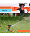 360 Degree Yard Sprinkler with Adjustable 45 to 90 Degree Spray in action watering a grassy lawn efficiently with stable base