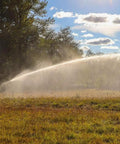 Heavy Duty Irrigation Spray Gun With Adjustable Angle Turbine Sprinkler And Replaceable Nozzles in action watering farmland