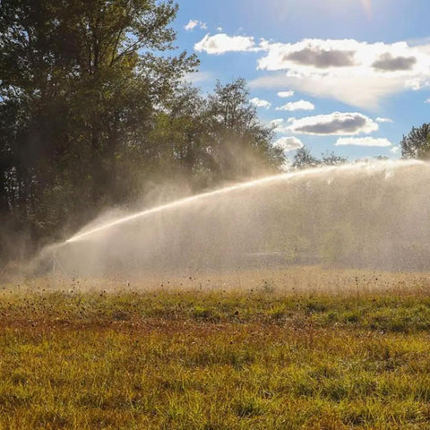 Heavy Duty Irrigation Spray Gun With Adjustable Angle Turbine Sprinkler And Replaceable Nozzles in action watering farmland