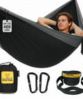Black and grey single camping hammock for outdoors, backpacking and travel gear, ultra light and portable parachute nylon