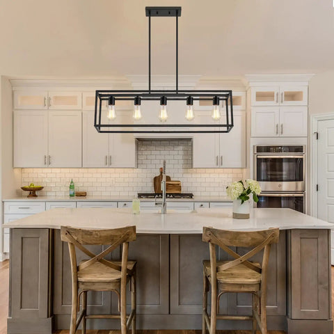 Top Shelf Black Five Light Linear Chandelier Featuring A Killer Geometric Metal Frame And Adjustable Hanging Rods For Down To Earth Farmhouse Kitchen Islands And Dining Spaces above a kitchen island with two wooden stools.