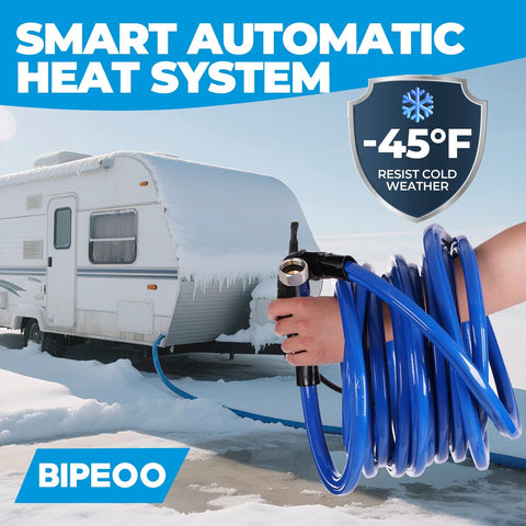 Blue 30ft heated RV water hose, coiled and held by hand, connected to a snow-covered RV.