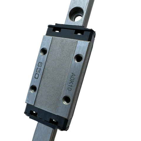 Close-up of SRS15 Linear Guide Block and Rail Kit for CNC machines, dual raceways LM guide carriage with ball bearings.