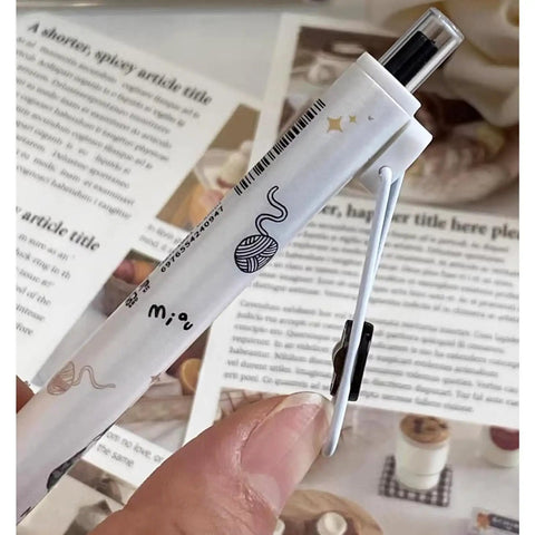 Close-up of Four Pack Cute Cat Gel Pens Retractable 0.5mm Black Ink Writing Pens For Girls Women Boys Kawaii Aesthetic Cartoon Pens