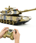 Hands holding remote control for 1/24 Scale RC Tank With Smoke Lights And Sounds Remote Control Battle Vehicle For Boys 2.4GHz
