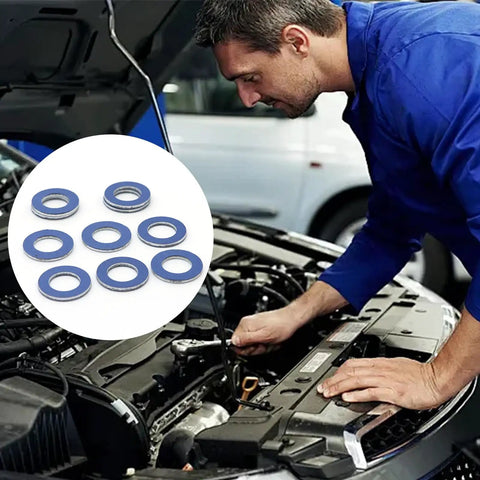 12 Pack Aluminum Oil Drain Plug Gaskets For Oil Pan Seal Durable Asbestos Free Gasket Set With Tight Seal To Prevent Leaks Ideal For Cars And Trucks For Most Vehicles. Mechanic inspecting aluminum oil drain plug gaskets in engine bay