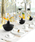 Six Pack Metal Table Top Torches With 23.5 Oz Citronella Fuel for Outdoor Parties and Garden Decor on elegant dinner table