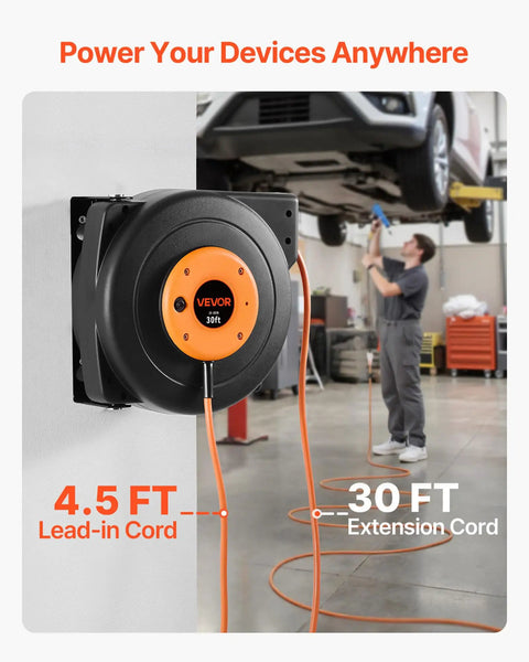 Heavy Duty 30 Ft Retractable Extension Cord Reel With Automatic Rewind And Triple Grounded Sockets mounted on wall, with 30 ft bright orange cord.