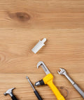 Killer Quality 50 Pack Shutter Repair Pins Spring Loaded Plantation Shutter Fasteners on wooden surface with tools.
