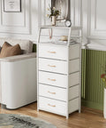 Five Drawer White Dresser With Wood Top And Steel Frame next to a sofa in a living room setting