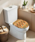 Elongated Native american indian ornament geometric ethnic Toilet Seat on a white toilet in a modern bathroom setting.