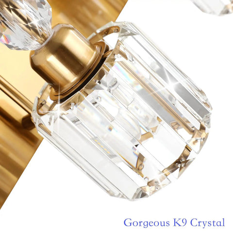 Close-up of Brass Gold 3 Light Vanity Light With Crystal Accents showing detailed crystal lampshade and brass base.