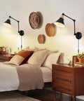 Slick Plug In Wall Sconce With Hella Smooth Dimmer Control And Flexible Swing Arm Featuring E26 Socket Ul Certified in bedroom setting.
