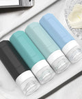 Leak Proof 3oz Travel Bottles TSA Approved Refillable Silicone Containers For Toiletries BPA Free lined on a tray