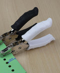 One Quarter Inch Circle Hole Puncher, handy handheld paper punch with soft grip handle punching green paper, ideal for crafts