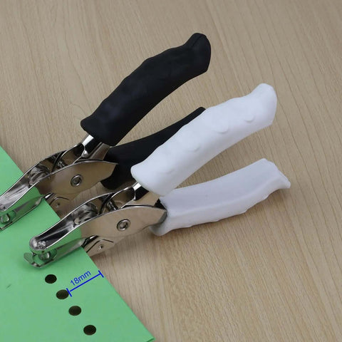 One Quarter Inch Circle Hole Puncher, handy handheld paper punch with soft grip handle punching green paper, ideal for crafts