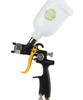 Pro Grade HVLP Gravity Feed Paint Spray Gun With 1.8 Mm Fluid Needle And 600Cc Cup, black handle and white cup, side view.