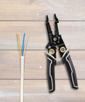Slick Compact Wire Stripper And Crimping Pliers Featuring Tough Nonslip Grips Plus Rapid Rebound Springs next to stripped wires.