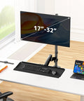 Premium Ergonomic Sit Stand Monitor Desk Mount With Wide Keyboard Tray For 17 To 32 Inch Screens in a modern office setup.
