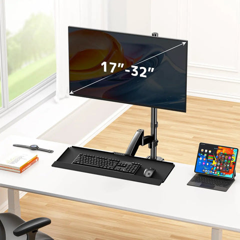 Premium Ergonomic Sit Stand Monitor Desk Mount With Wide Keyboard Tray For 17 To 32 Inch Screens in a modern office setup.