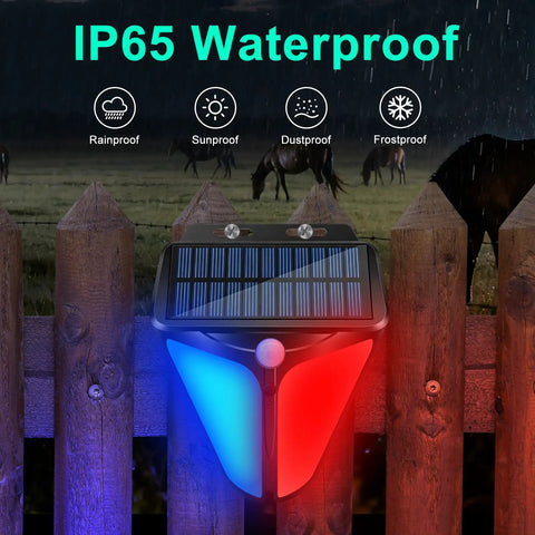 Solar Strobe Warning Lights With 90dB Alarm Outdoor 2 Pack, IP65 waterproof feature on wooden fence with blue and red lights