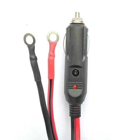 Close-up of a 10 Ft 12V Cigarette Lighter Extension Cord With Glowing Led Ring And 15A Inline Fuse with wire ends.