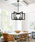 Height Adjustable Matte Black Chandelier Six Light 25 Inch Modern Industrial Dining Room Pendant Light, hanging over dining table in bright room.