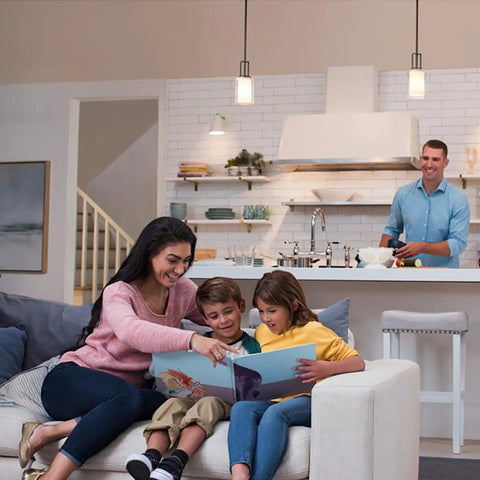 Reliable Wall Dimmer Switch For Dimmable LED CFL And Halogen Bulbs With Frustration Free Hookup And Buttery Smooth Control For Single Pole Or Three Way Installations In Solid Midnight Trim in a cozy family living room.