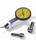 Dial test indicator with yellow dial face, 0-15 scale, 0.0005 in graduations; includes mounting adapters.