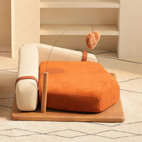 Modern Wooden Pet Hangout Haven With Swinging Toy, Built Like A Tank Oak Veneer Sofa Bed, Ultra Comfy High Resilience Foam Cushion, Scratch Proof Elevated Pad For Big Cats And Dogs with orange cushion and hanging toy.