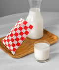 Race Car Themed Gift Bags With Handle Pack Of 50 Portable Lightweight Plastic Candy Bags Checkered Pattern beside milk jug
