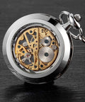 Mens Classic Steampunk Pocket Watch Gold Skeleton Hand Wind Mechanical Timepiece with visible gears on dark surface