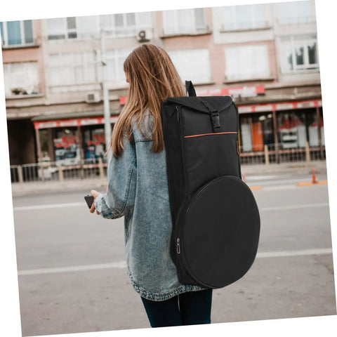 Young woman carrying a 12 Inch Practice Snare Drum Bag Built Like A Tank With No Sweat Waterproof Oxford Cloth.