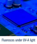 Electronic circuit board coated with Silicone Conformal Coating 422C, 55 mL Bottle For Electronics, fluorescing under UV light.
