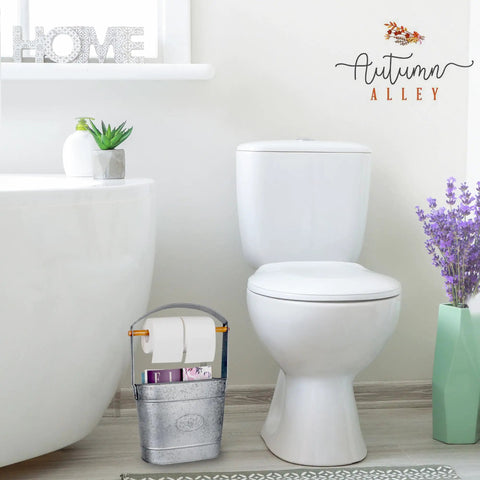 Farmhouse Freestanding Toilet Paper Holder With Reserve Storage For Mega Rolls And Magazines next to a toilet